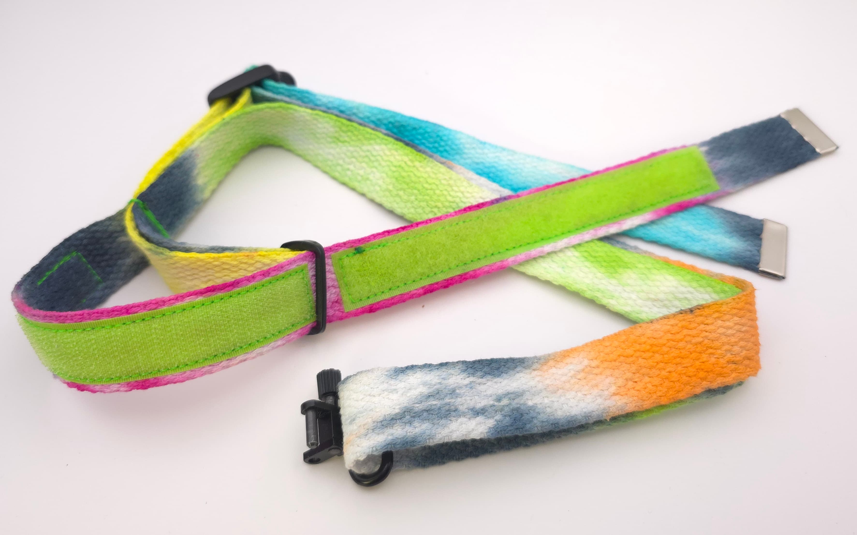 StayTightSling — cotton gun sling with velcro grip, in bright colors